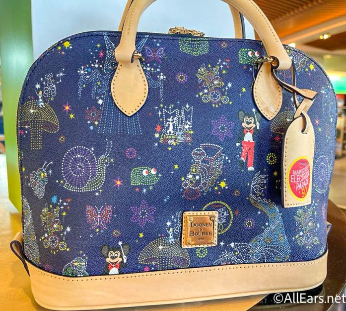 PHOTOS: NEW Dooney & Bourke it's a small world Collection Sailing Into  Walt Disney World on June 14th - WDW News Today