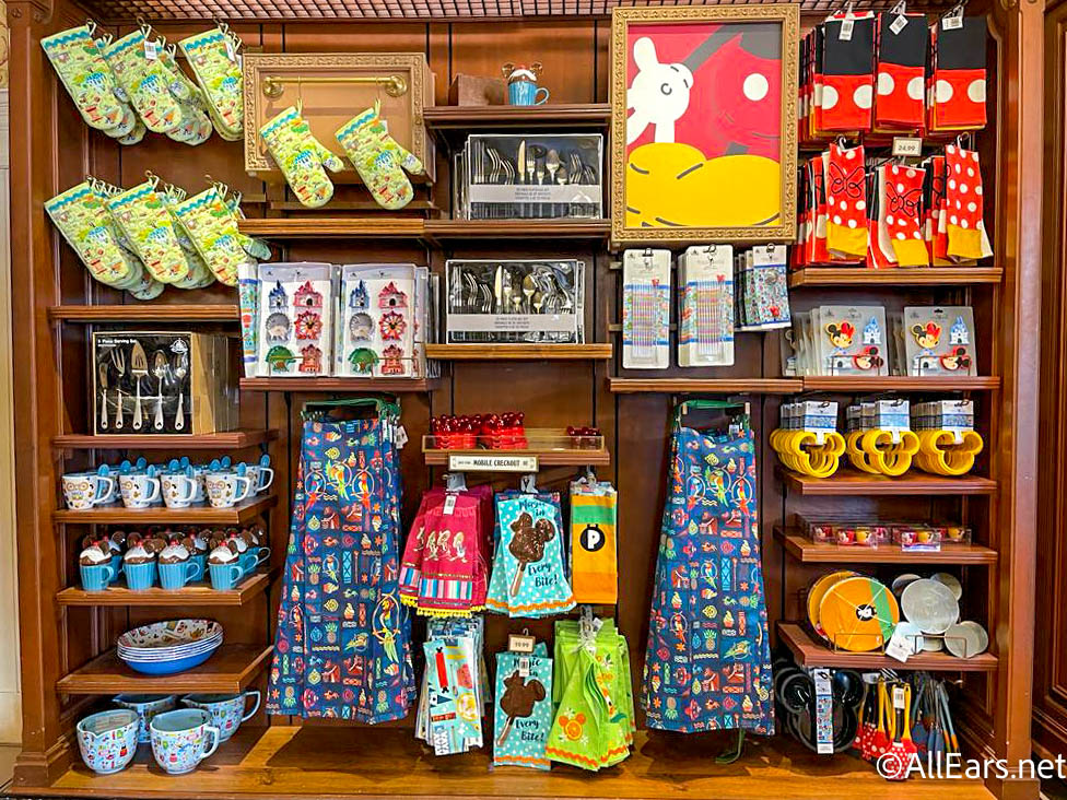 https://allears.net/wp-content/uploads/2022/12/2022-wdw-atmos-merchandise-general-kitchen-apron-mugs-pot-holder-76.jpg