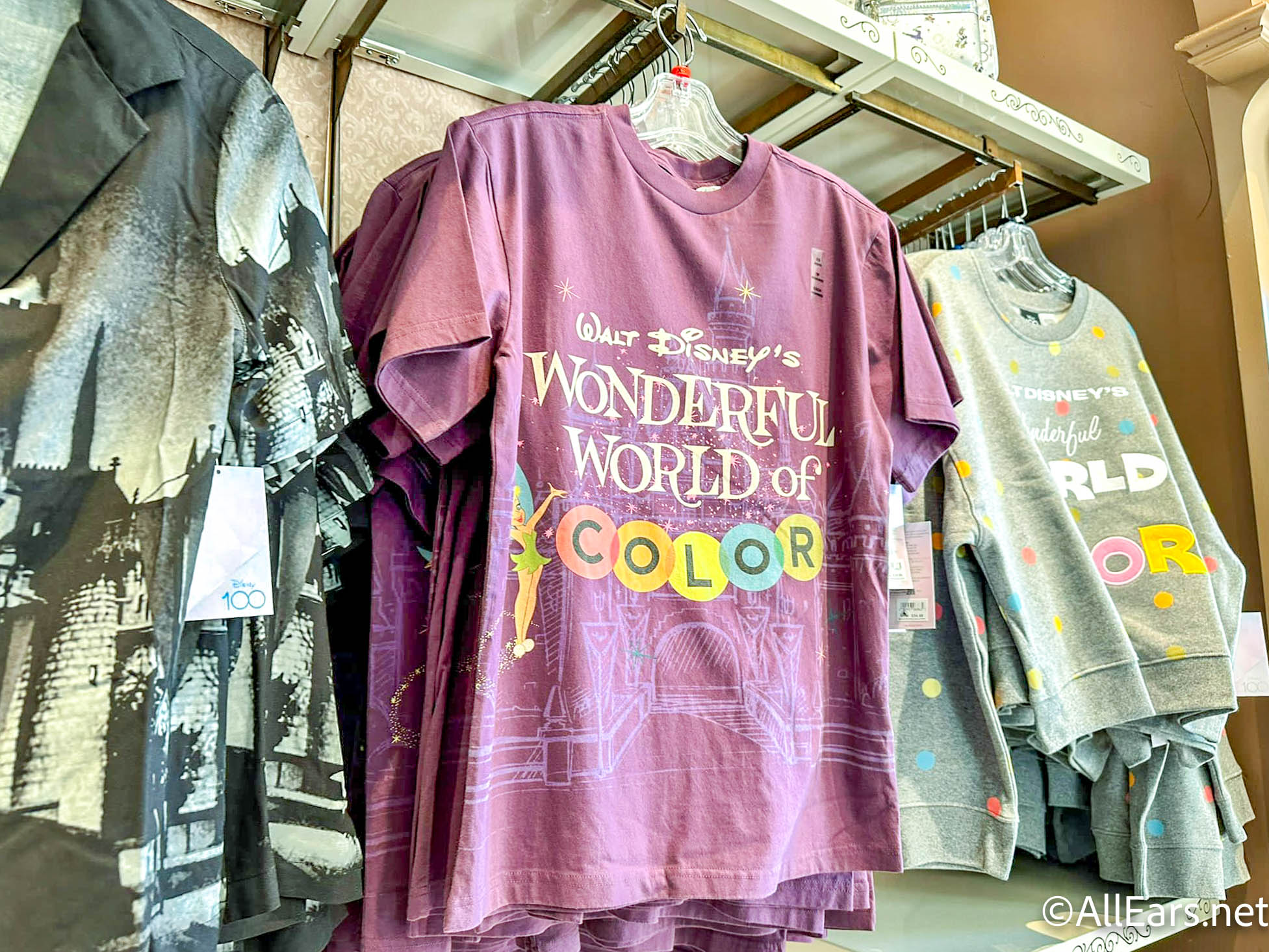 2023 wdw MK magic kingdom emporium disney100 100th anniversary walt disneys  wonderful world of color collection purple shirt-6 - AllEars.Net