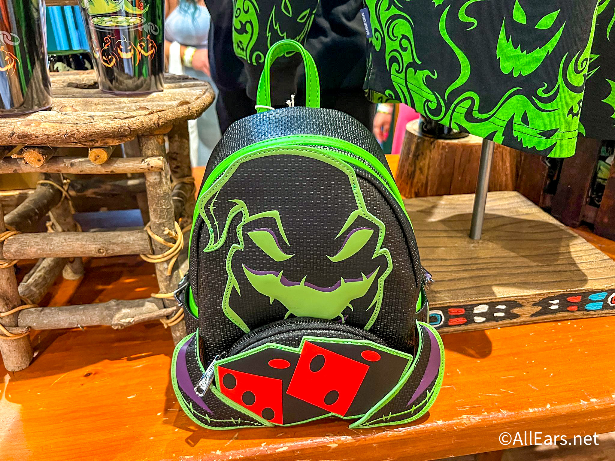 PHOTOS: New Evil Queen and Maleficent Loungefly Backpacks Cast a