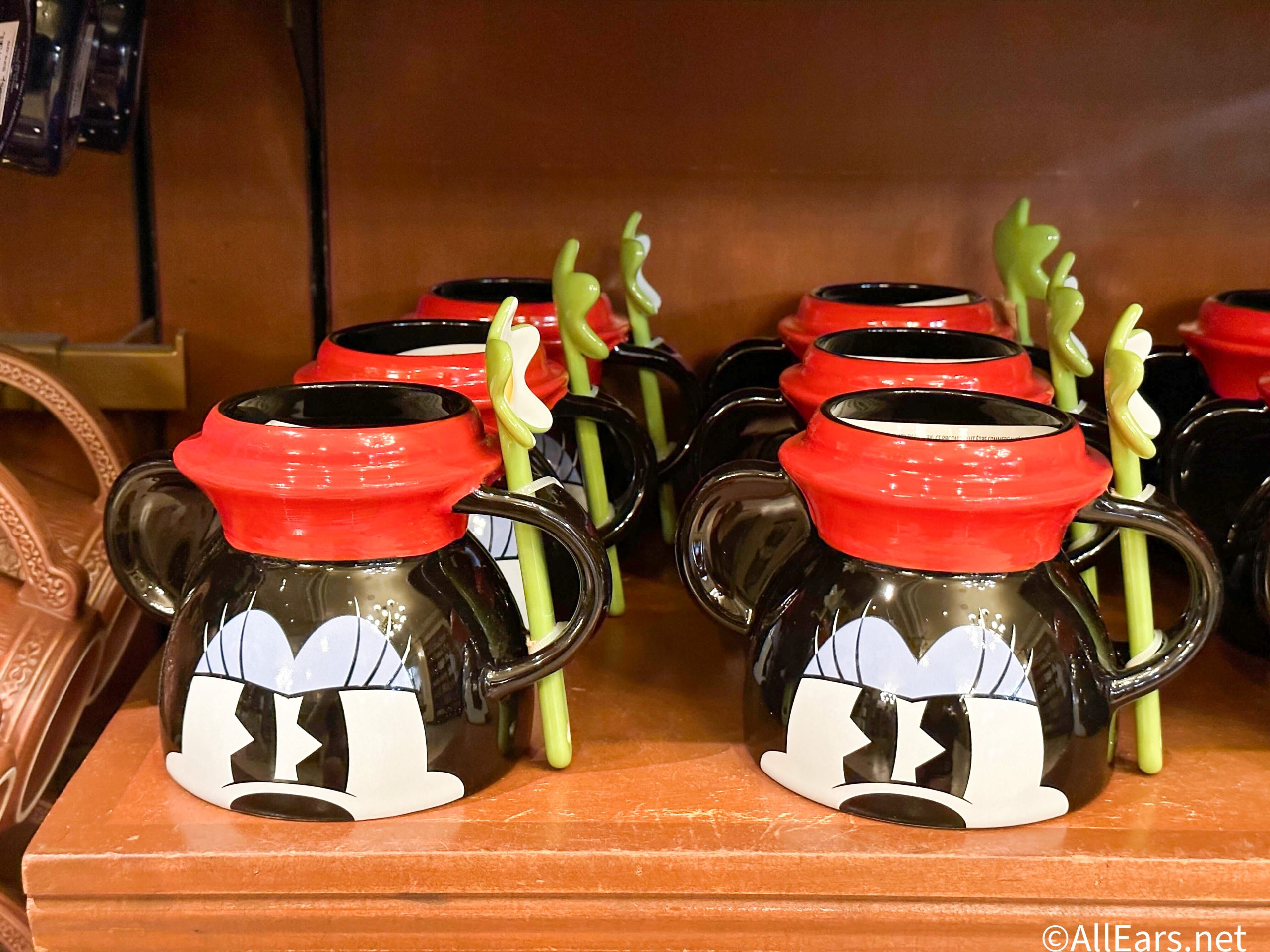 https://allears.net/wp-content/uploads/2023/10/2023-wdw-mk-main-street-usa-the-emporium-minnie-mouse-mug-with-flower-stir-scaled.jpg