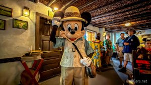Mickey Mouse wearing safari hat in tusker house